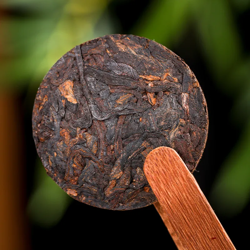 7 прессованных маленьких блинов пуэра с клейко-рисовым ароматом «Линлун» в бумажной упаковке 500 г (2)