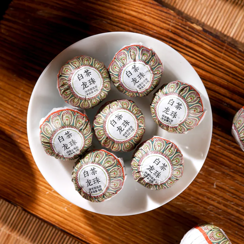 Белый чай из Юньнани «Лунчжу» 8 г в упаковке 250 г (1)