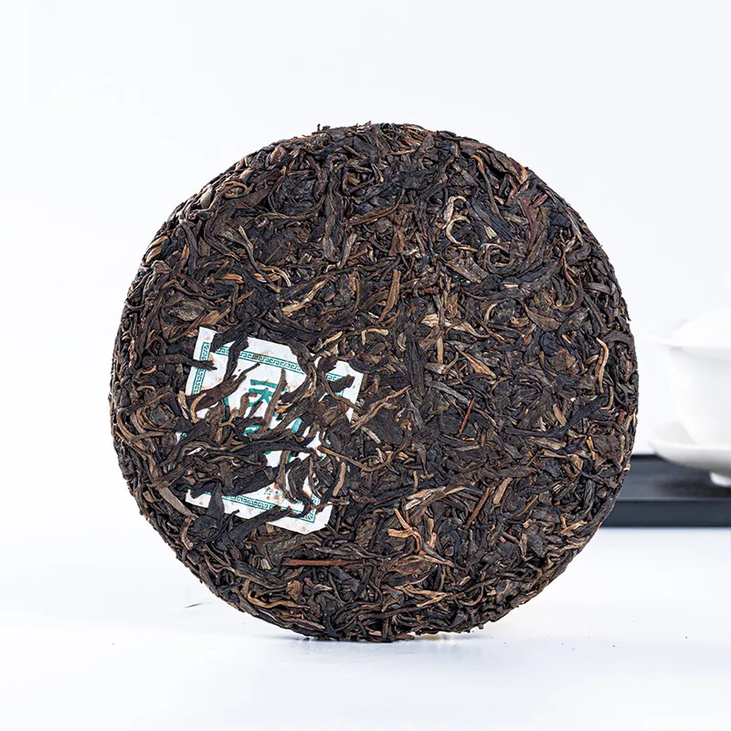 Прессованный блин сырого пуэра «Весенняя мелодия» с древних деревьев горы Буланшань 2012 года 357 г (2)